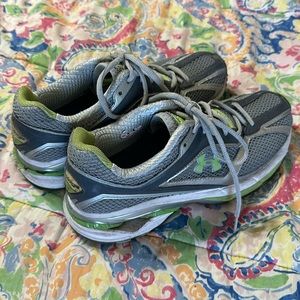 Gray Under Armour tennis shoes
